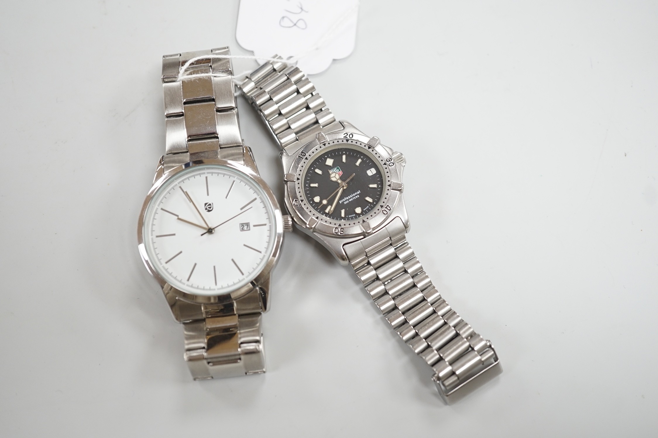 A gentleman's stainless steel Tag Heuer quartz wrist watch, together with a gentleman's stainless steel backed Owim GMBH & Co quartz wrist watch.
